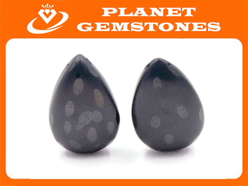 Pair of frosted black spinel briolettes, pear-shaped