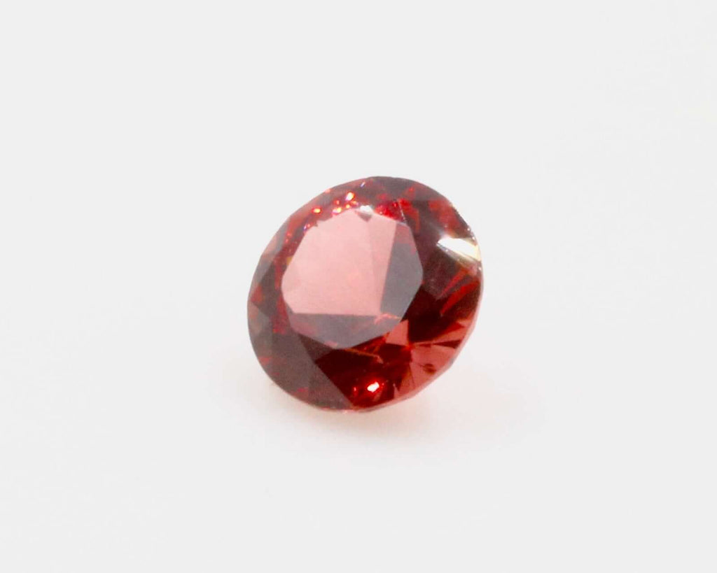 Natural spinel gemstone, deep red hue, loose