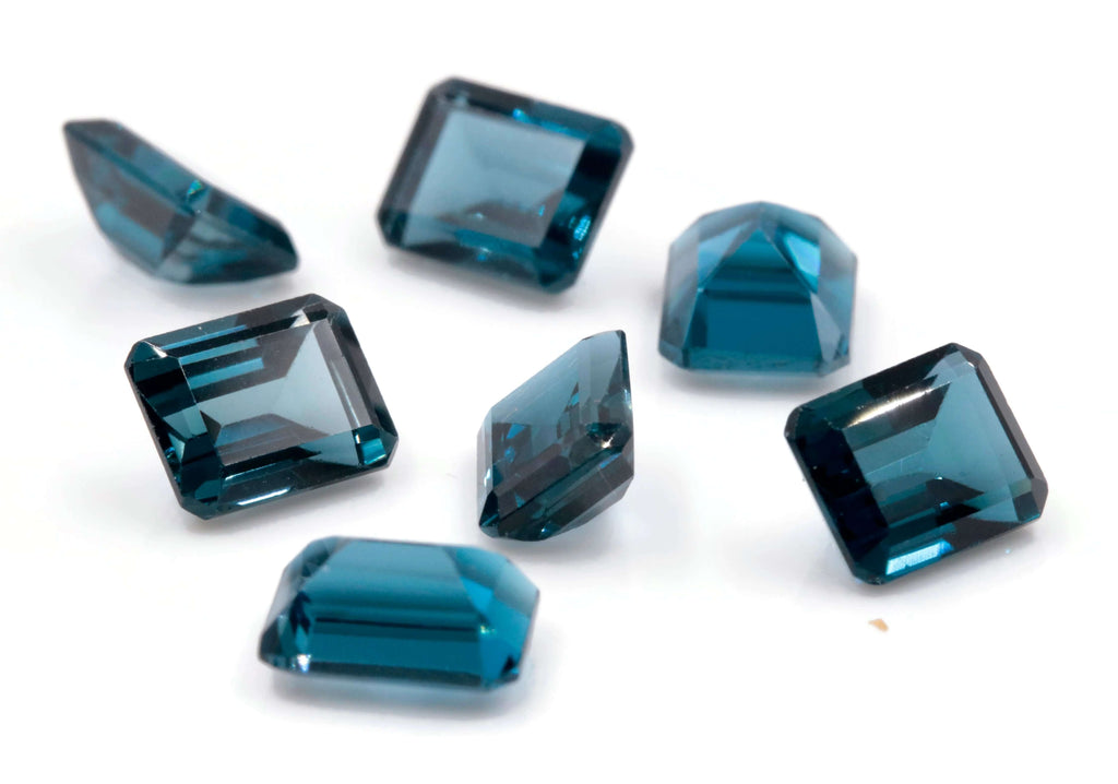 Topaz Emerald cut 9x7mm-Blue Topaz-Planet Gemstones