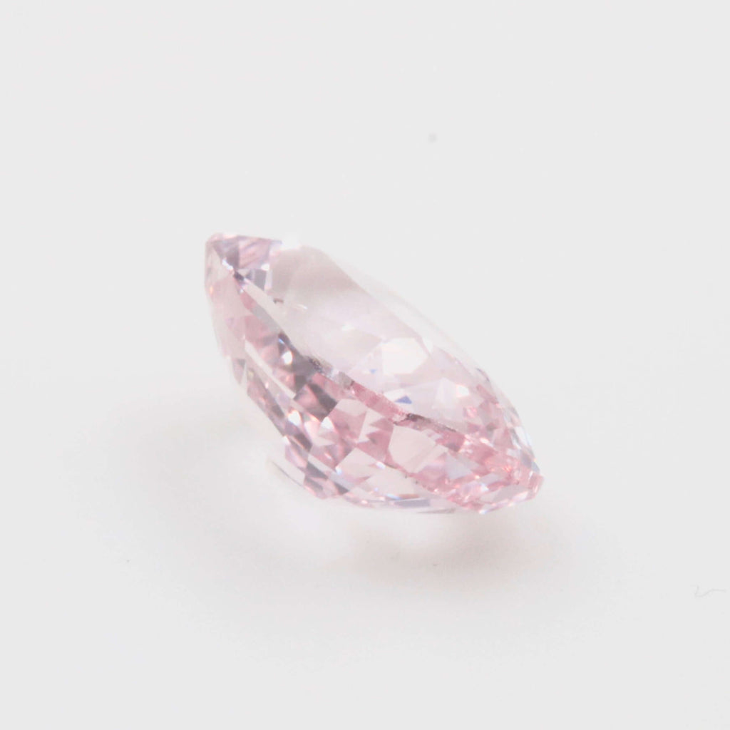 Pink sapphire gemstone with faceted cut
