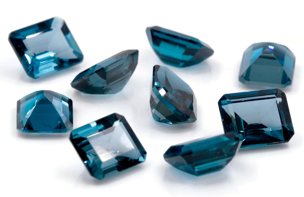 Topaz Emerald cut 11x9mm-Blue Topaz-Planet Gemstones