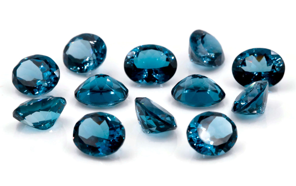Topaz Oval 12x10mm-Blue Topaz-Planet Gemstones