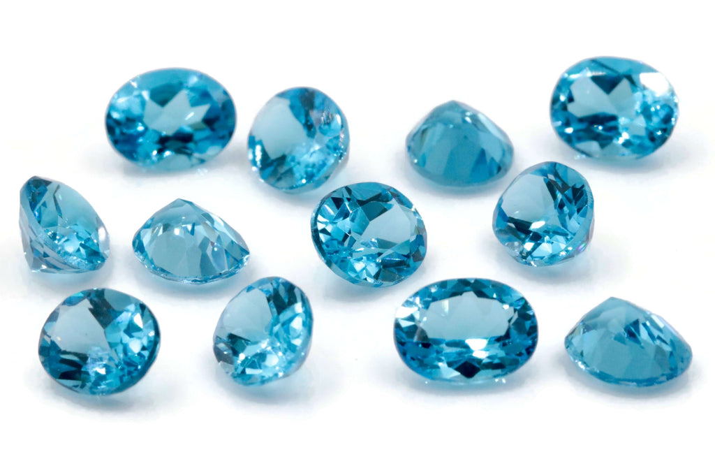 Topaz Oval 9x7mm-Blue Topaz-Planet Gemstones