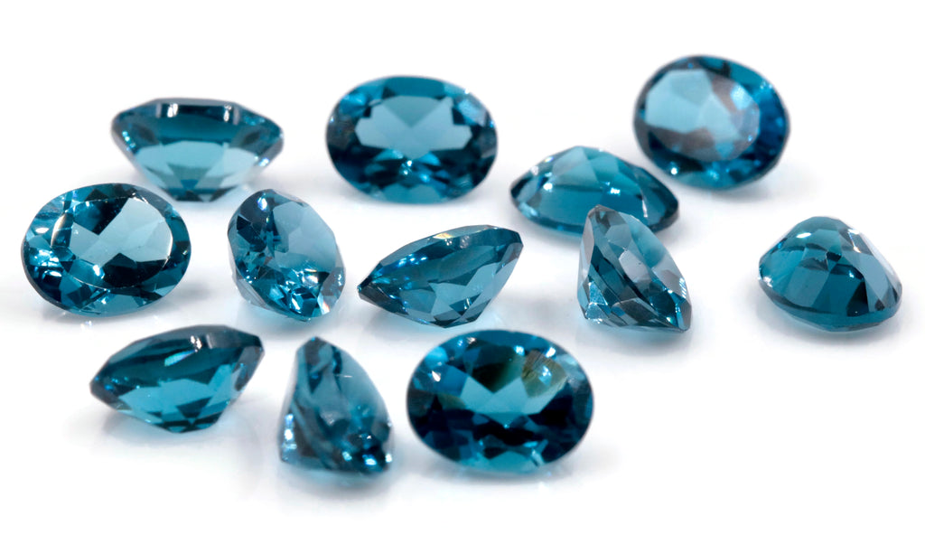 Topaz 9x7mm-Blue Topaz-Planet Gemstones