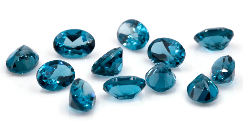 Topaz Oval 7x5mm-Blue Topaz-Planet Gemstones