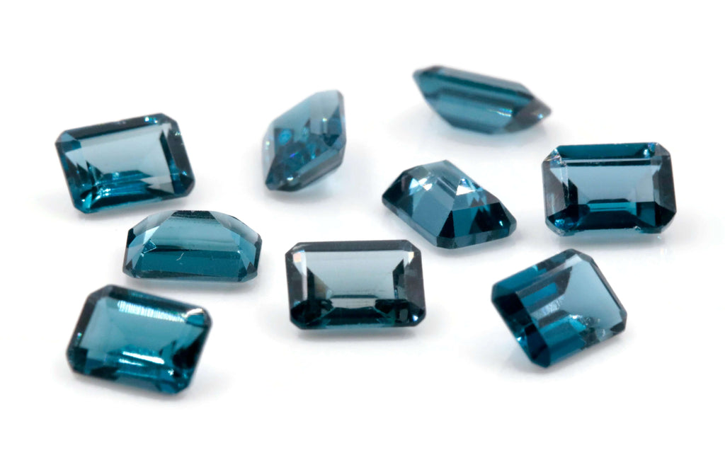 Topaz Emerald cut 7x5mm-Blue Topaz-Planet Gemstones