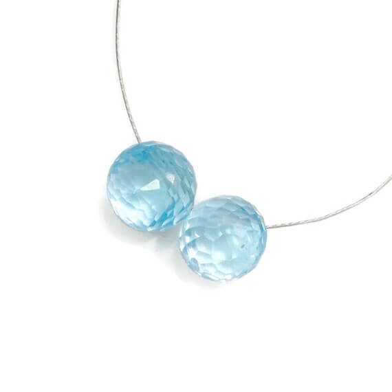 Pair of sky blue topaz faceted onion drop beads